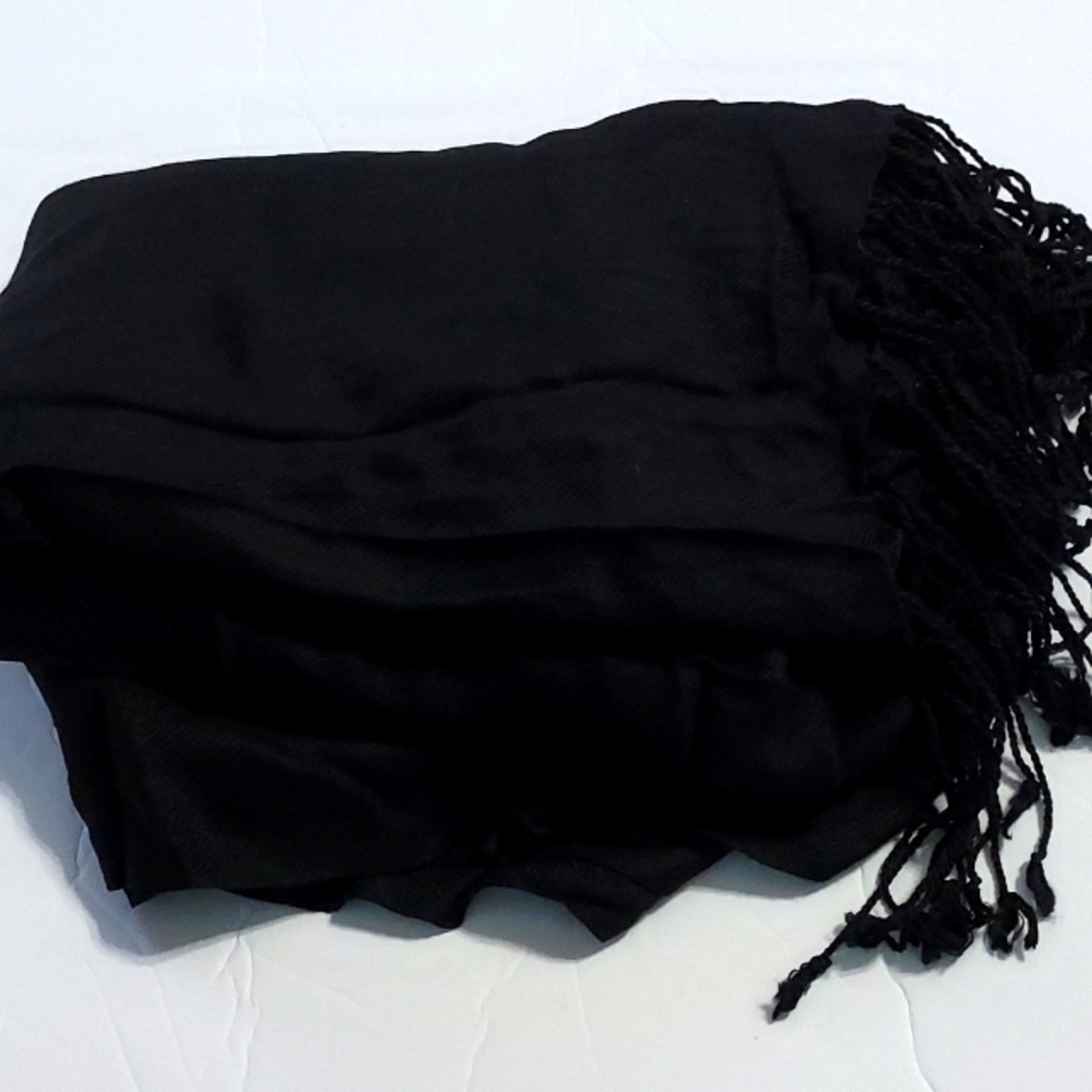 Black Wrap Around Shawl with knot tassels at the ends. It is Gently Used.